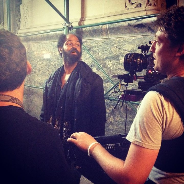 Brandon on a handheld rig during an interview setup